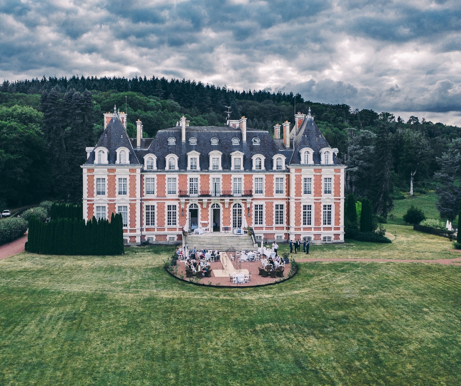 View of Chateau de la Cazine Aerial, atmospheric grey cloudy skies