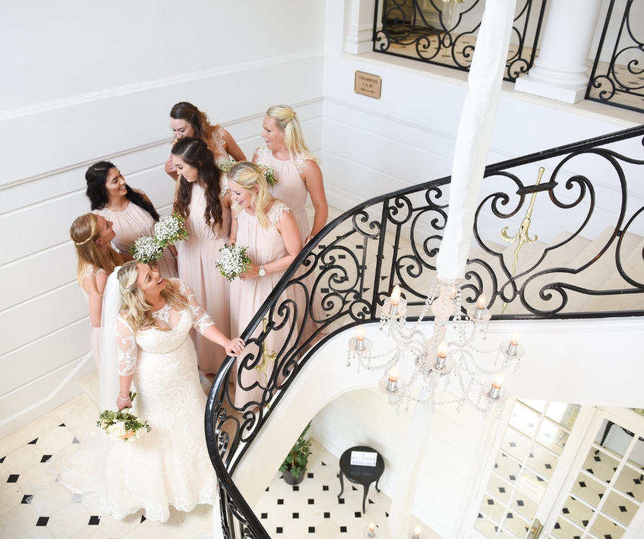 Real wedding Bride and bridesmaids staircase at Chateau de la Cazine, Limoges, Central France